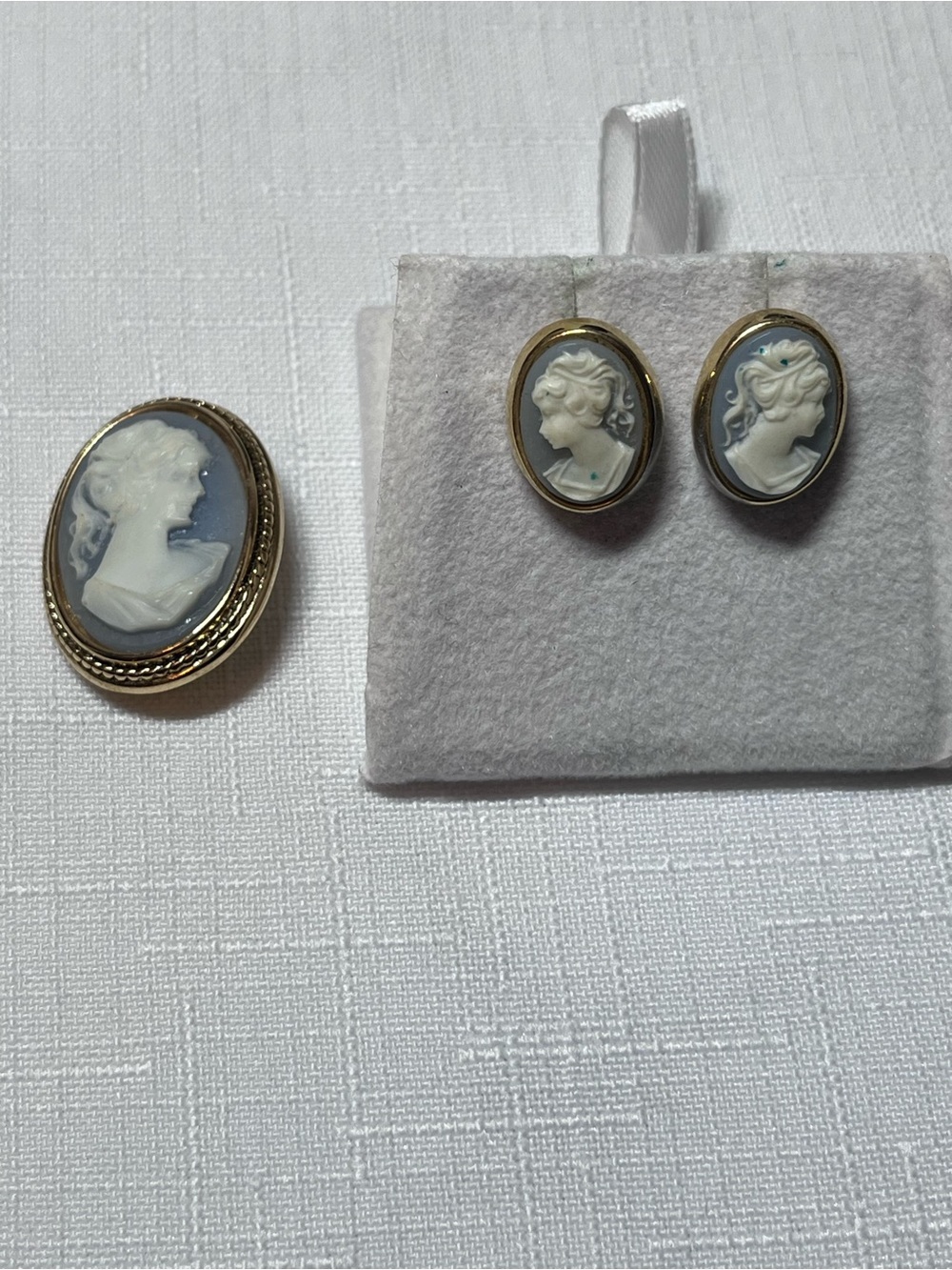 Vintage Gold-Tone White Cameo Brooch and Earrings Set with Blue-Grey Background